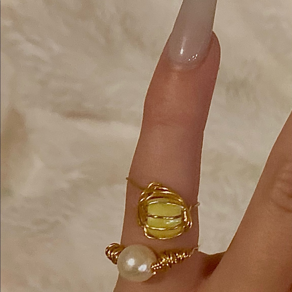 cage and pearl ring